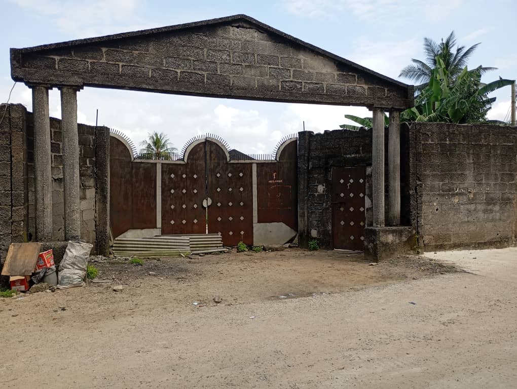 3plots of land, fenced with gate