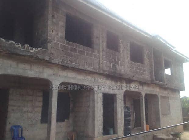 Four sets of two bedrooms flats on a two plots of land.